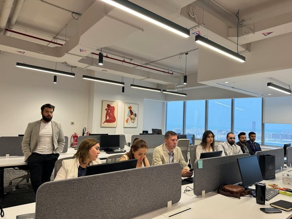 How can leaders in UK organizations develop effective mentoring programs?